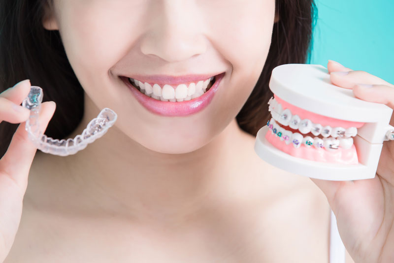 Smiling Patient with Invisalign